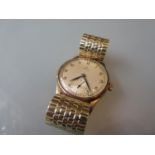 Gentlemans 1940's Omega 9ct gold cased wristwatch, the silvered dial with Arabic numerals and