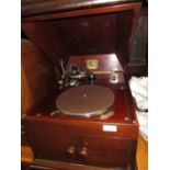 HMV mahogany cased table top wind-up gramophone including a folio of classical records