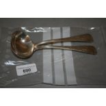 Pair of Victorian silver sauce ladles with engraved Old English pattern handles
