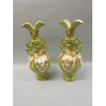 Pair of Japanese Satsuma pottery two handled vases decorated with panels of figures and a phoenix,