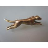 9ct Gold brooch in the form of a greyhound