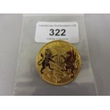 Circular gilt metal and enamel badge, England lion and Welsh dragon