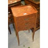 Pair of French kingwood inlaid three drawer tray top bedside tables with floral inlaid decoration on