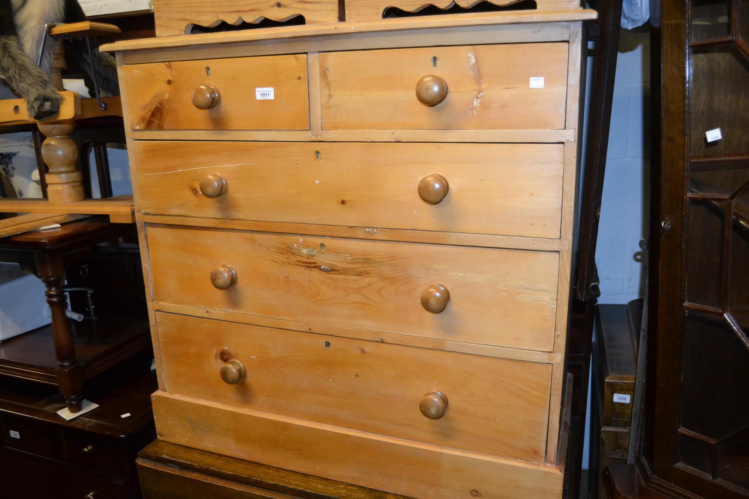 Small stripped and polished pine chest of two short and three long graduated drawers with knob