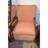 Pair of early 20th Century mahogany bergere and upholstered armchairs (at fault)