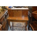 Edwardian mahogany marquetry inlaid bonheur-du-jour, the top with a brass gallery above drawers