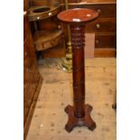 Reproduction mahogany torchere together with a reproduction mahogany sofa table and hall table