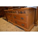 Large late Victorian oak chest, the moulded top above seven drawers with oval brass handles raised