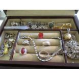 Brown jewellery box containing quantity of silver rings, silver and enamel charm bracelet and