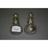 Pair of silver overlaid and engraved glass scent bottles with stoppers