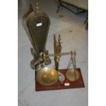 Pair of 19th Century brass balance scales on a mahogany base together with a brass fan shaped