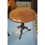 George III mahogany circular pedestal table having turned reeded tapering column on cabriole