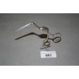 Pair of Victorian silver tongs in the form of a bird, the beak with serrated grips, makers mark WWW