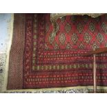 Pakistan Bokhara design carpet (slight damage)