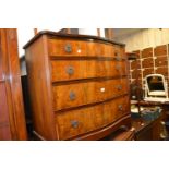 1930's Figured walnut serpentine fronted four drawer chest with a reeded top, brass handles and