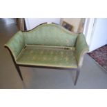 20th Century mahogany scroll armed window seat with green floral upholstery on square tapering