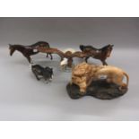 Group of four Beswick figures, a lion, an eagle and two horses, together with a Royal Doulton figure