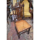 19th Century carved oak side chair with a cane seat, small oak corner stick stand, an octagonal gilt