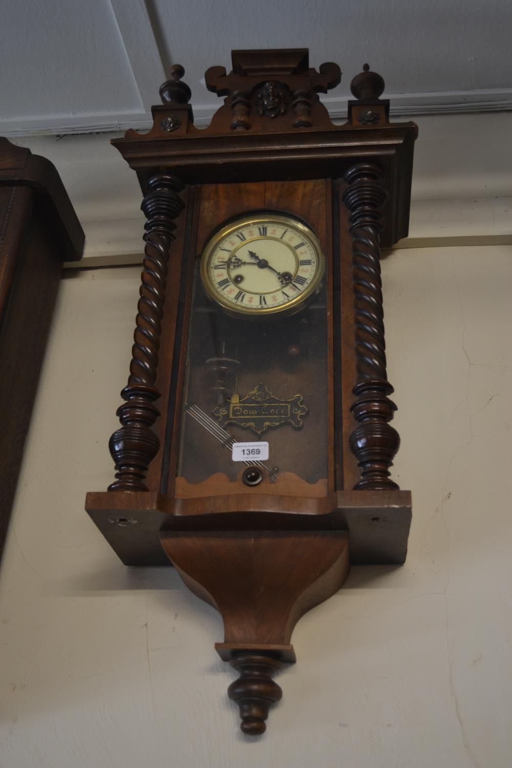 Small late 19th Century Continental walnut Vienna cased wall clock with two train movement, the case