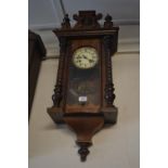 Small late 19th Century Continental walnut Vienna cased wall clock with two train movement, the case