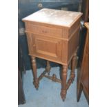 French oak marble top bedside cabinet with single drawer over cupboard on turned supports