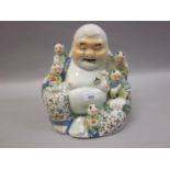 20th Century Chinese porcelain figure of seated Buddha with attendants, signed with seal mark and