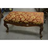19th Century rectangular oak footstool with an upholstered top above shaped frieze on cabriole
