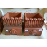 W. Meeds & Son, pair of square terracotta planters having tudor rose decoration, 11ins square