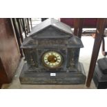 Large 19th Century black slate and gilt metal mounted mantel clock, the gilt and enamel dial with