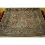 Turkish rug having all-over floral and bird design with multiple borders on a beige and green