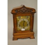 Late 19th Century oak cased bracket clock, the silvered and gilded dial with Roman numerals,