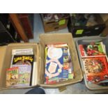 Three boxes containing a quantity of approximately 450 plus football programmes, books and magazines