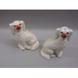 Pair of 19th Century Staffordshire figures of seated spaniels