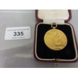 Circular 9ct gold 1921 London Football Association professional charity fund medal, in fitted case