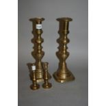 Pair of large 19th Century brass knopped stem candlesticks and a pair of smaller candlesticks