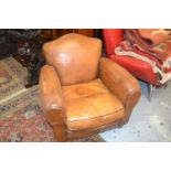 Pair of early 20th Century tan leather upholstered club armchairs