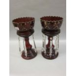 Pair of 19th Century ruby glass lustres with prismatic glass drops