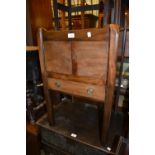 Early 19th Century mahogany tray top commode having two flush panel doors above a single drawer on