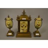 19th Century gilt brass and porcelain clock garniture, the panels painted with various birds, with a