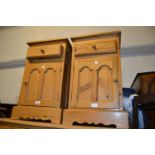 Pair of polished pine bedside cabinets with single drawers above Gothic style panel doors