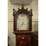 George III mahogany longcase clock, the arched hood with fluted columns above an arched door and
