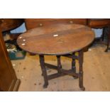 Small reproduction oak folding gate leg table and a nest of three reproduction oak rectangular