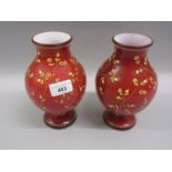 Pair of Victorian pink opaque glass baluster form vases