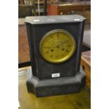 Large 19th Century black slate mantel clock, the engraved brass dial with Roman numerals, signed A.