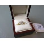 Modern 18ct yellow gold and multiple diamond set ring of lozenge shaped cluster design