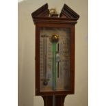 Mahogany and line inlaid stick barometer with silvered dial