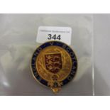 Circular gilt metal and enamel England V Scotland badge