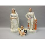 Pair of large 19th Century Staffordshire figures of Queen Victoria and Prince Albert, together