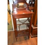 Small Edwardian mahogany and line inlaid display cabinet with an oval mirrored top above a single