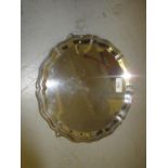 20th Century circular Chester silver salver on three scroll feet